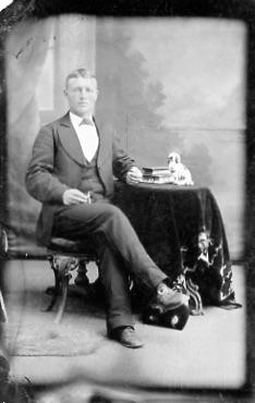 Tin Photograph - Unidentified Man Posing with a Table 