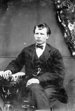 Tin Photograph - Unidentified Man Sitting Next to a Table 